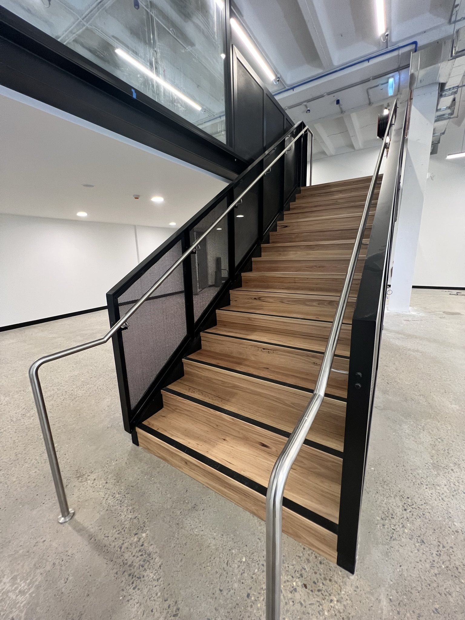 The minimalist stair screen makes a bold statement with stunning results. Modern, elegant and creative.